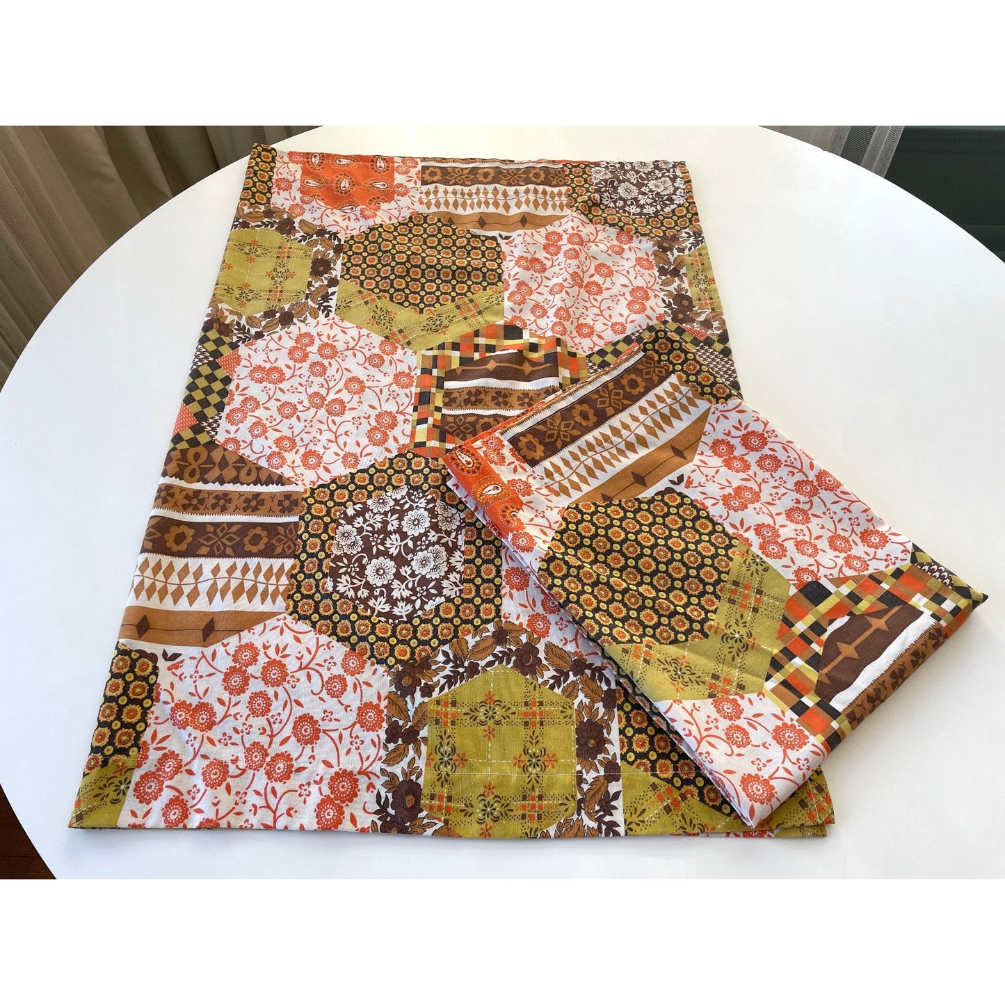 Vintage 70s faux patchwork pattern, orange and brown curtains