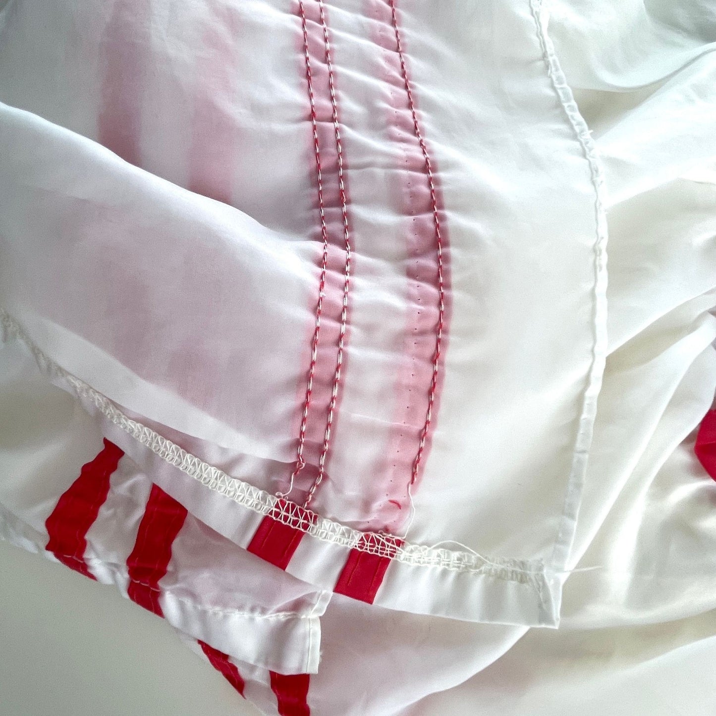 Vintage 80s ruffled satin bedspread, twin size, white with red ribbons