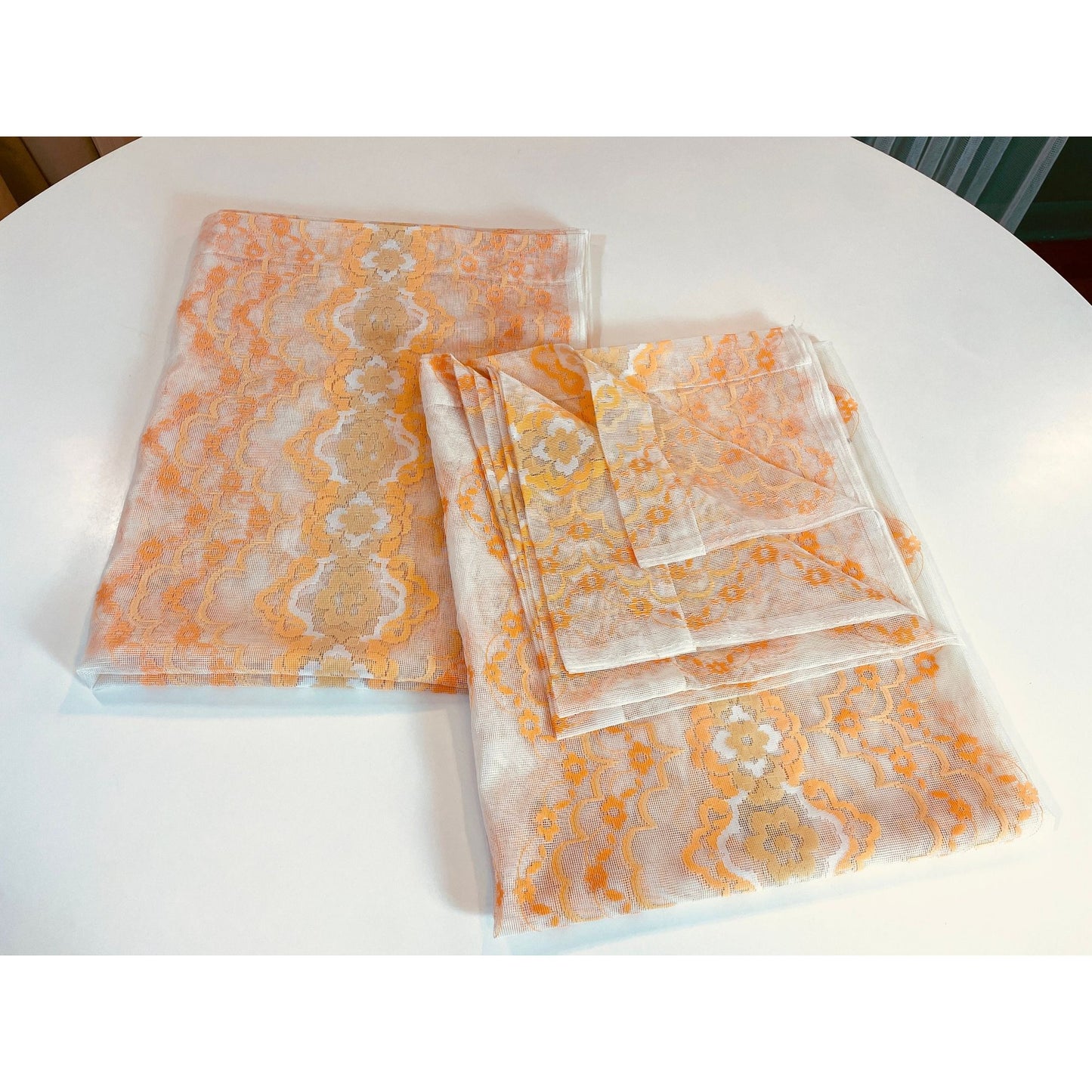 Vintage 70s mesh curtains, orange white groovy pattern, pair