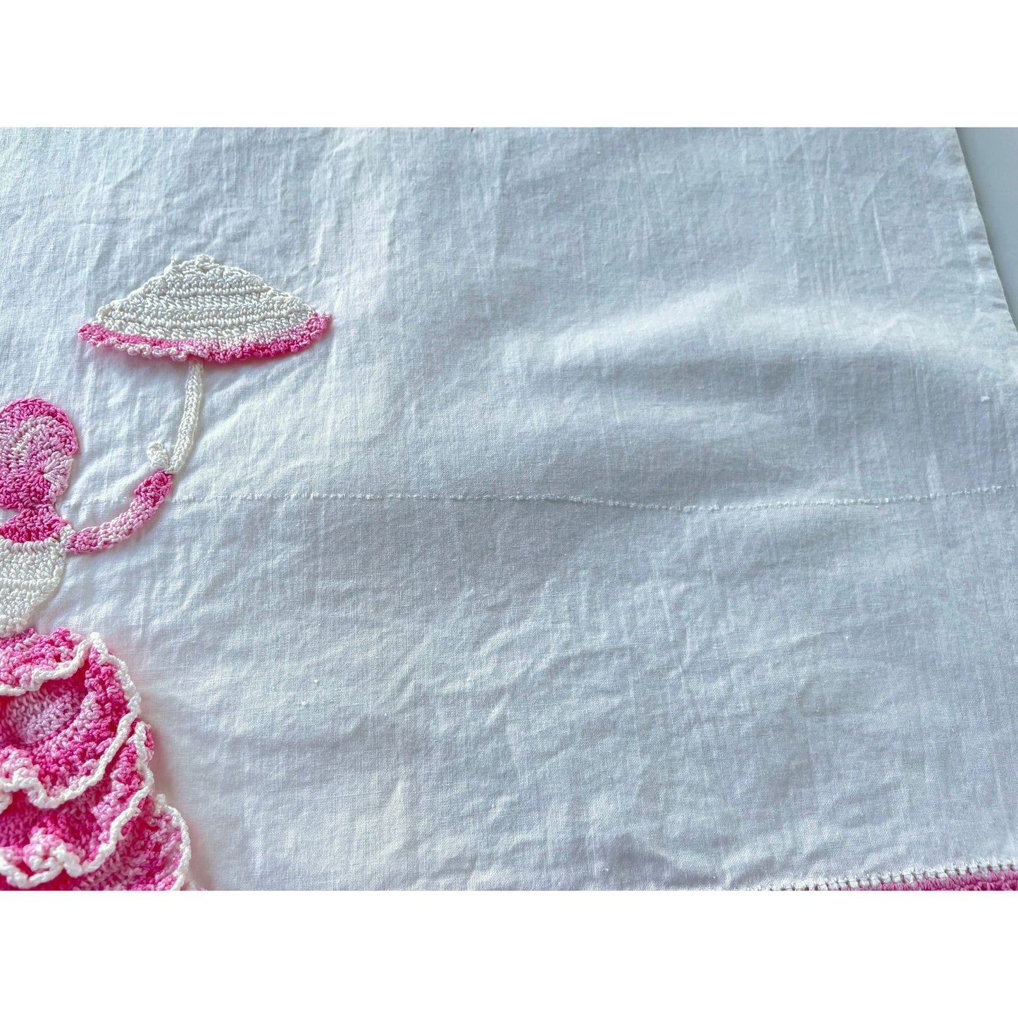 Vintage embroidered pillowcase, percale, pink crocheted lady