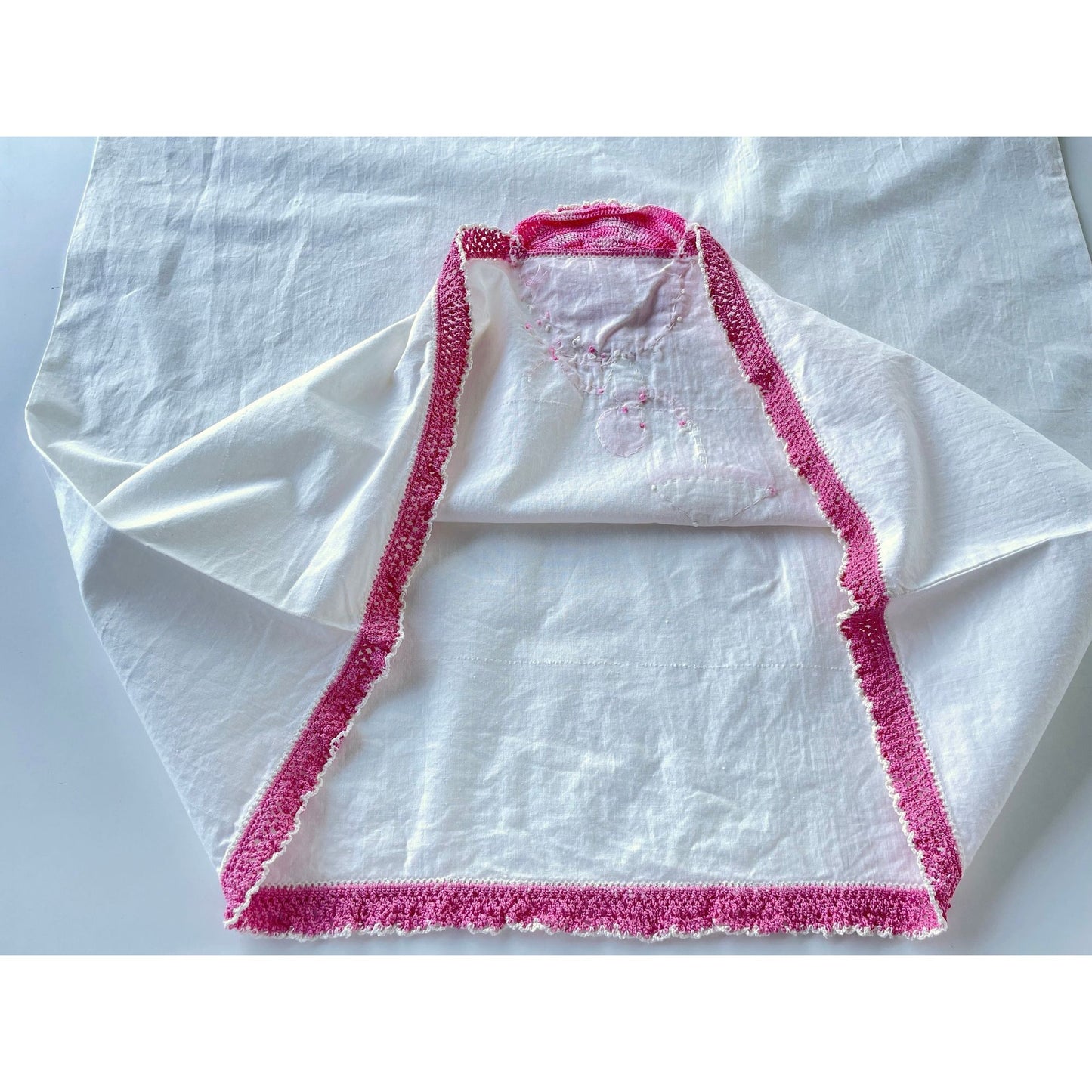 Vintage embroidered pillowcase, percale, pink crocheted lady