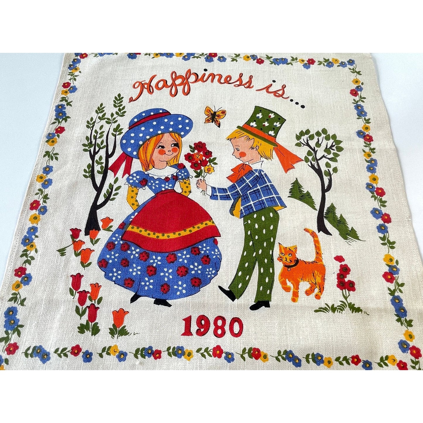 Vintage 1980 calendar tea towel, "Happiness is...", English/French