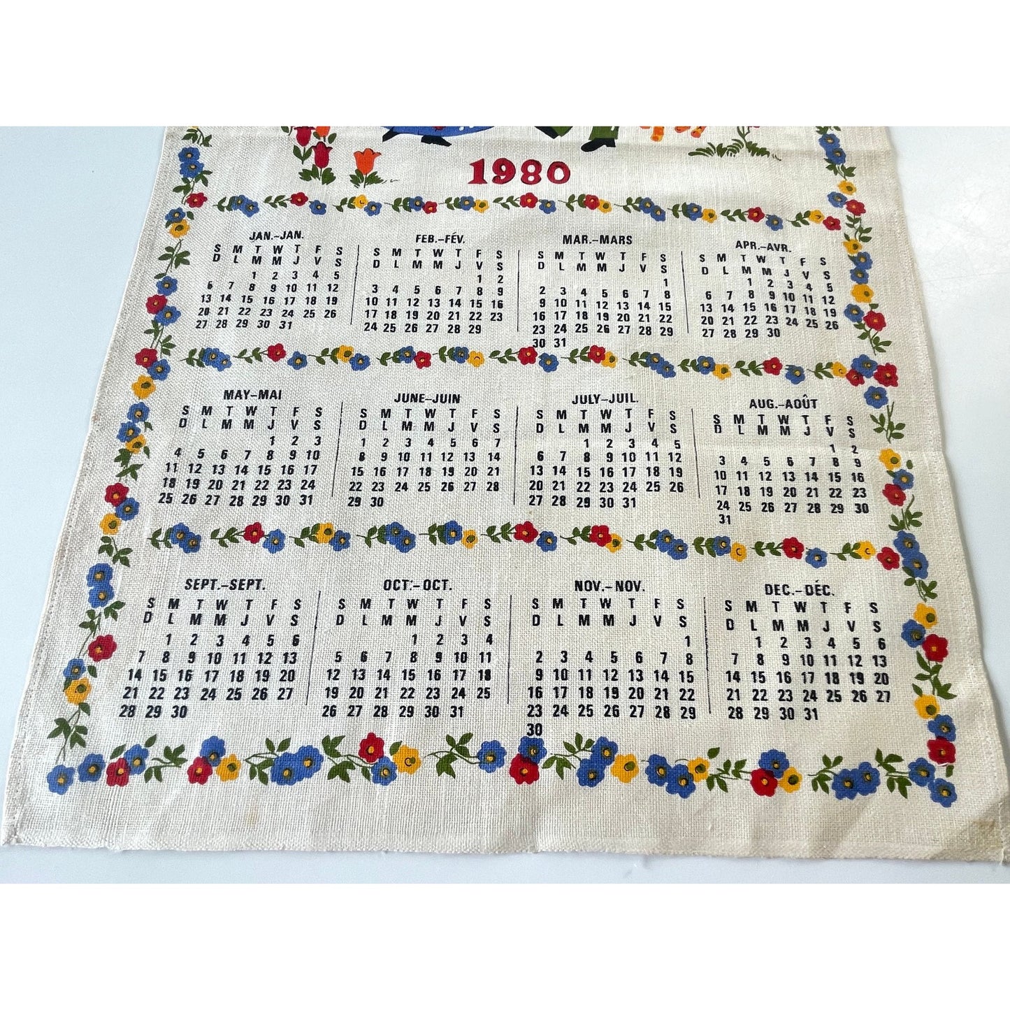 Vintage 1980 calendar tea towel, "Happiness is...", English/French