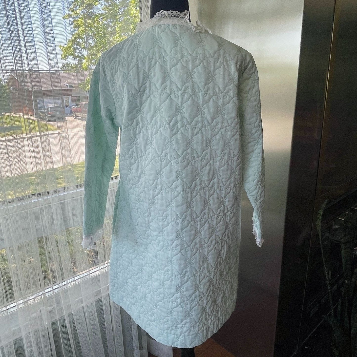 Vintage 1950s quilted bed jacket, mint green, zipped