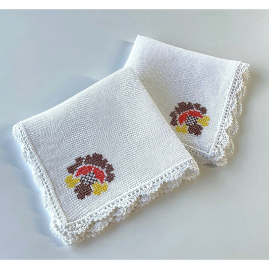 Vintage pair of embroidered napkins