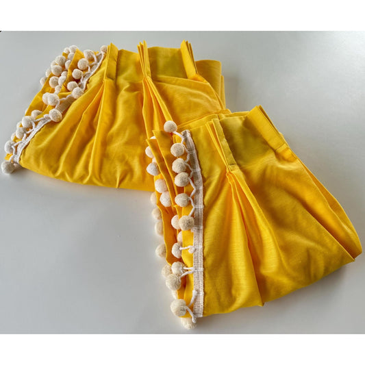 Vintage 70s pleated curtain, bright yellow pompoms panel