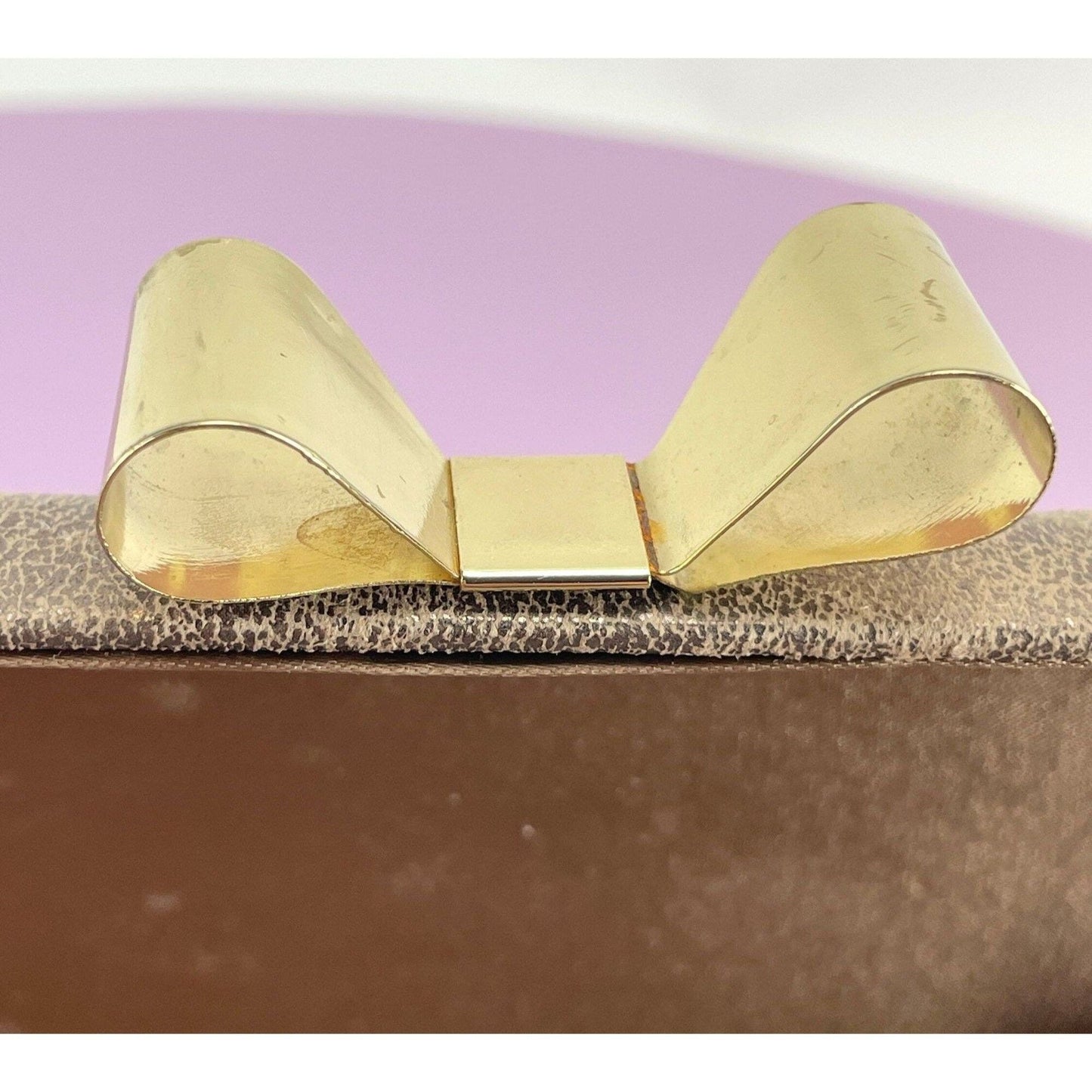Vintage 80s hard shell clutch, gold tone, bow clasp