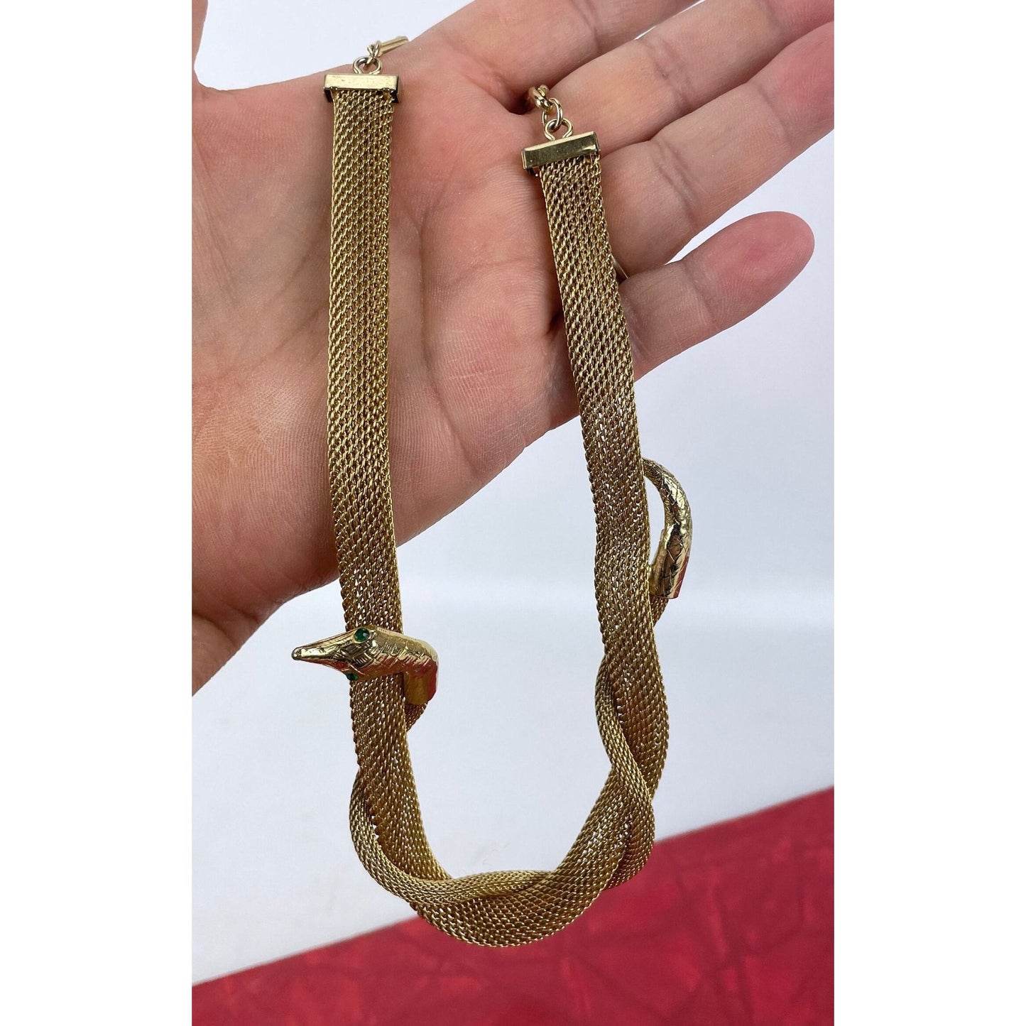 Vintage 80 necklace, nake head and tail, green eyes, gold tone tube mesh
