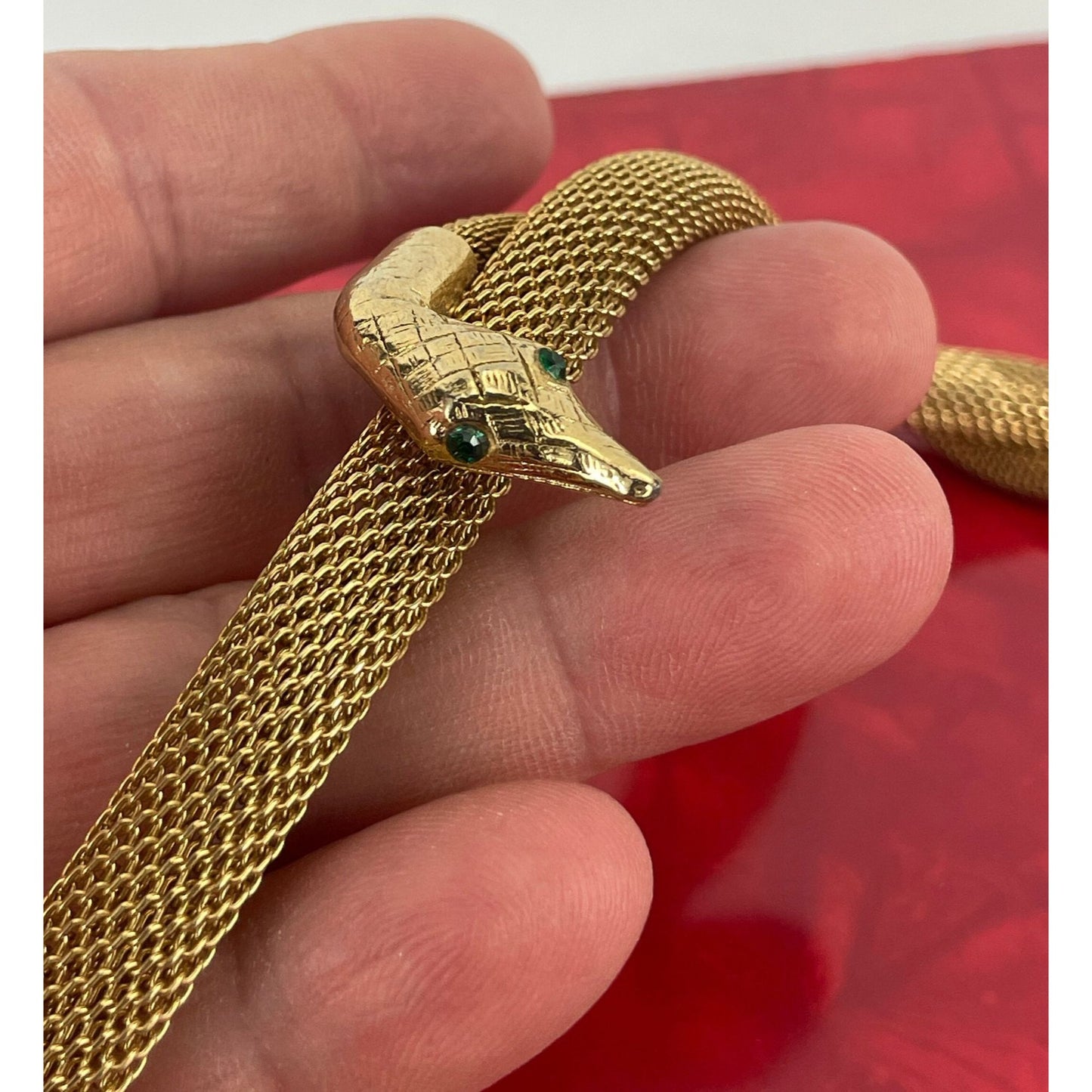 Vintage 80 necklace, nake head and tail, green eyes, gold tone tube mesh