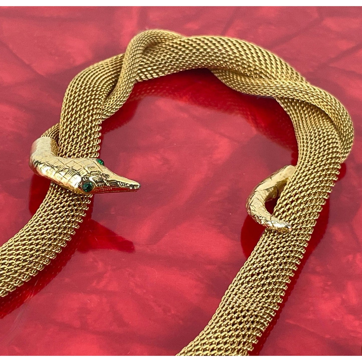 Vintage 80 necklace, nake head and tail, green eyes, gold tone tube mesh