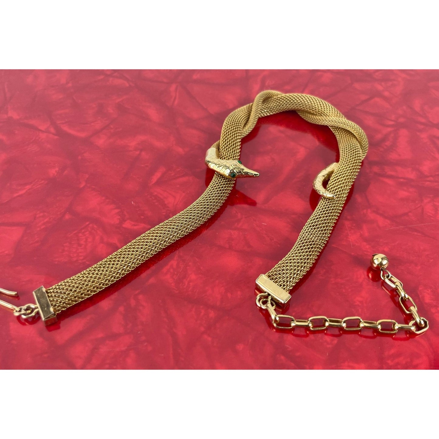 Vintage 80 necklace, nake head and tail, green eyes, gold tone tube mesh