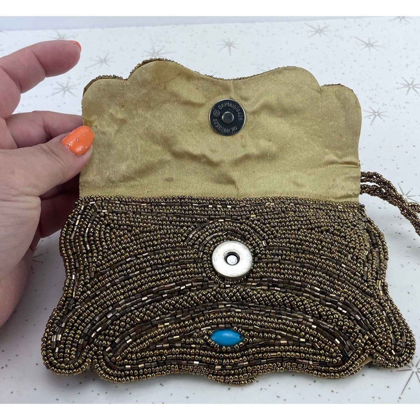 Vintage 50s bronze beaded wristlet, with turquoise accents