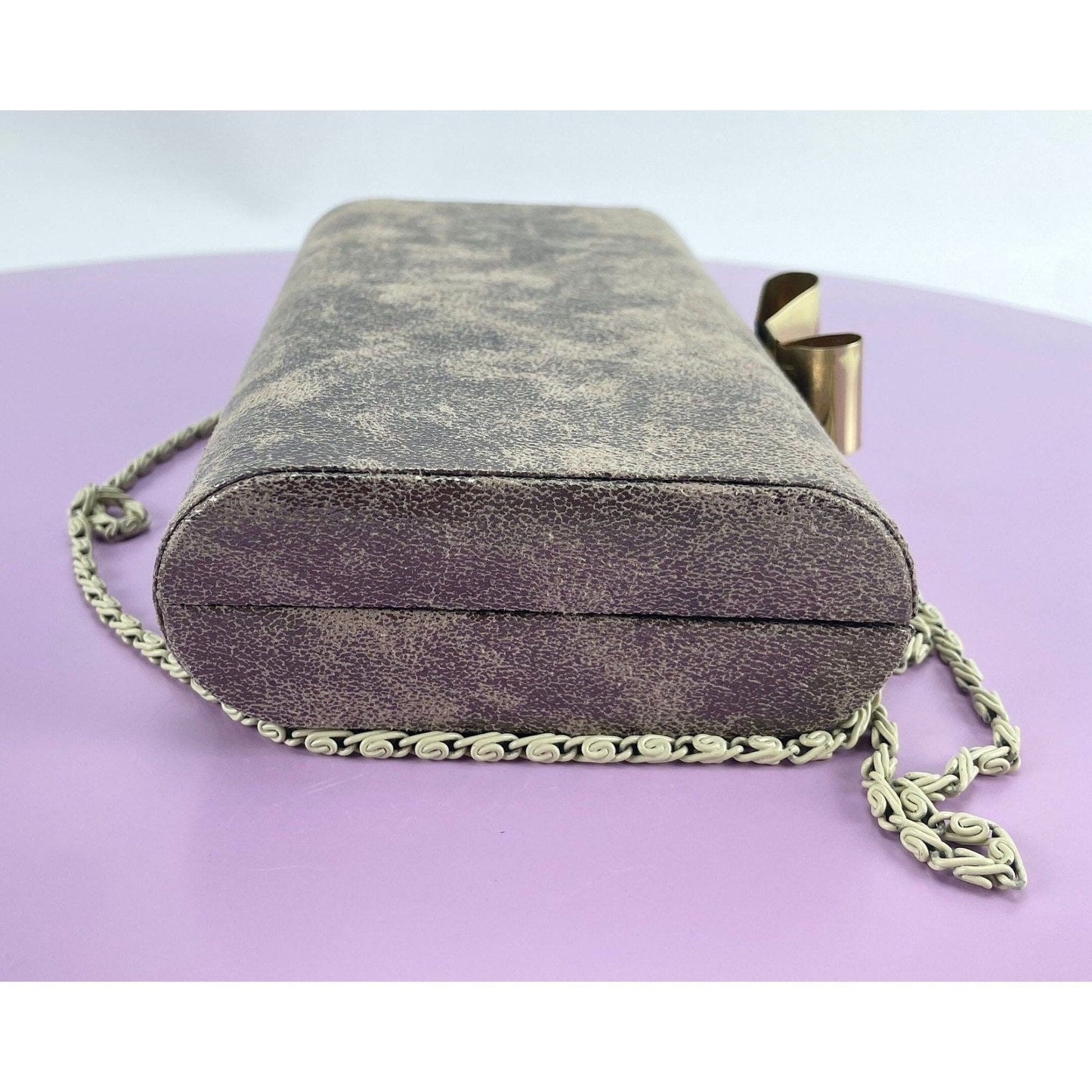 Vintage 80s hard shell clutch, gold tone, bow clasp