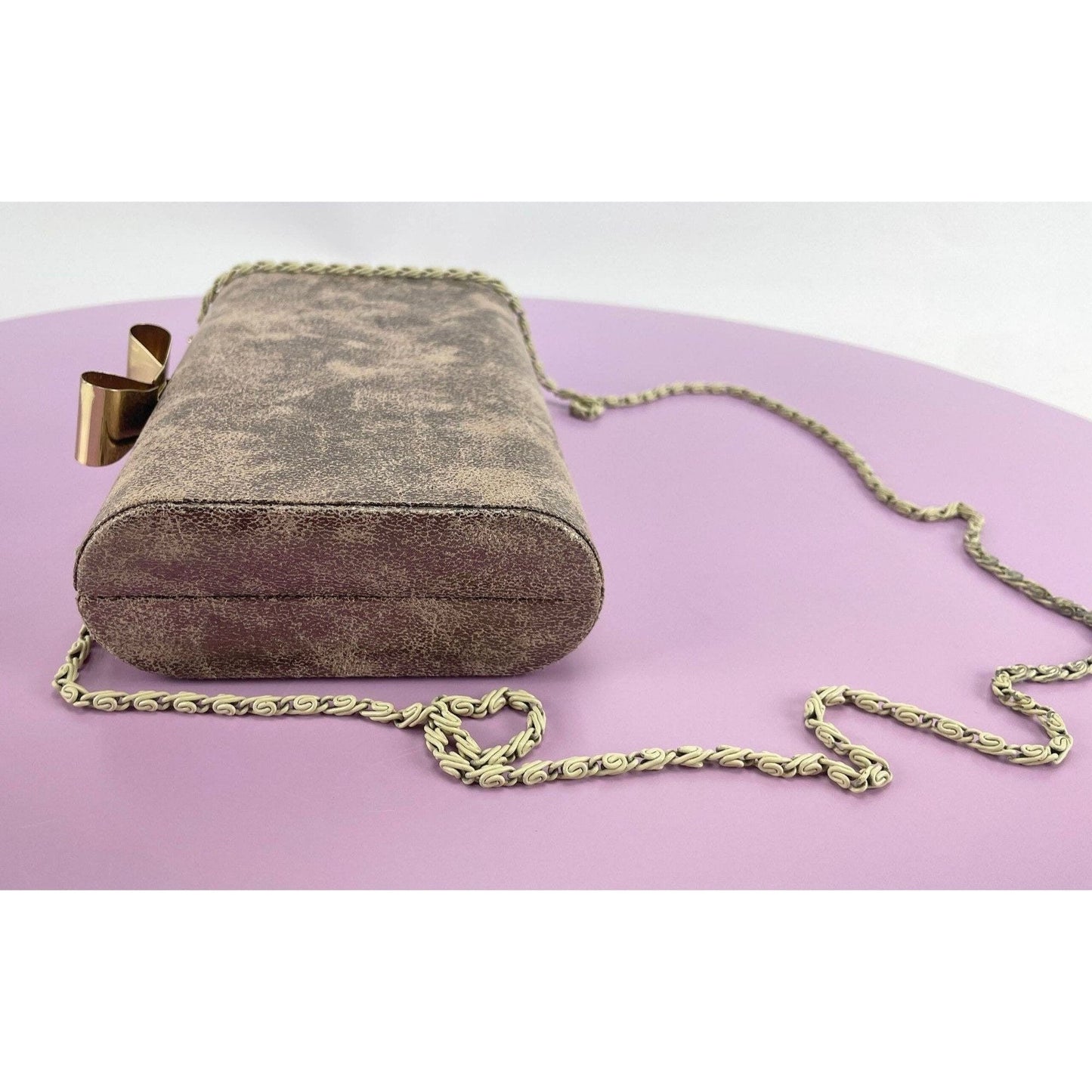 Vintage 80s hard shell clutch, gold tone, bow clasp