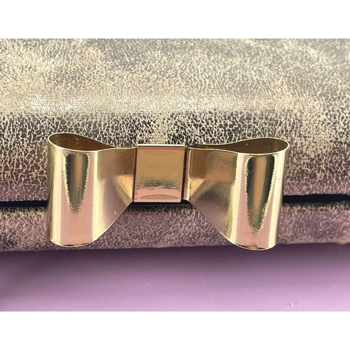Vintage 80s hard shell clutch, gold tone, bow clasp